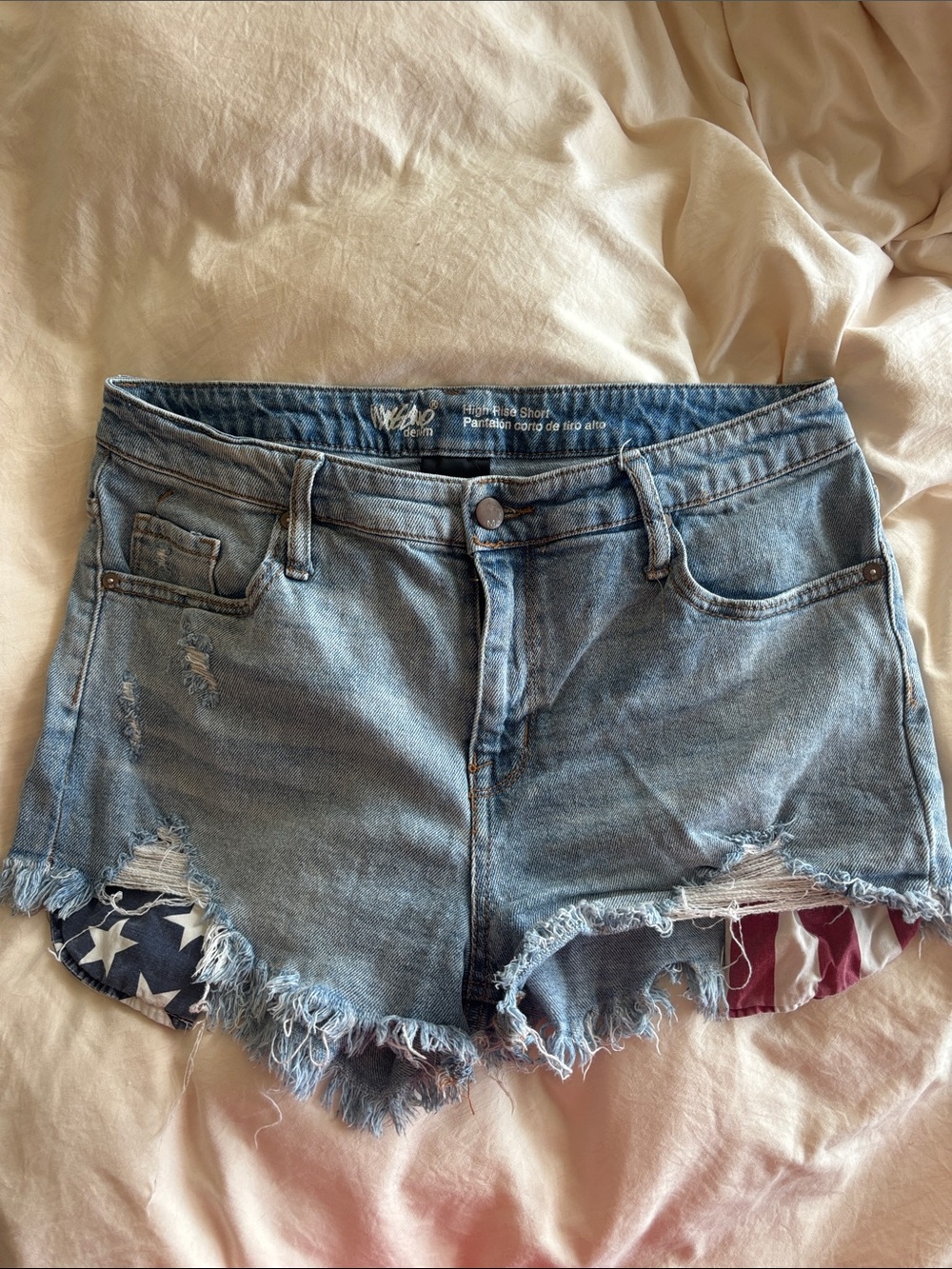 Light Blue Distressed High-Rise Jean Shorts with Flag Detail